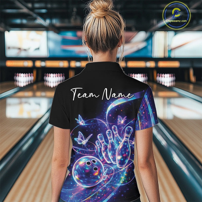 Female model in a black bowling polo with starry galaxy graphics, glowing neon swirls, and hologram butterflies, back view