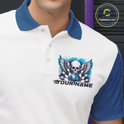 Close-up view of the left chest on a bowling polo shirt featuring a gothic winged skull design with a bowling ball and bowling pins in a white and blue color scheme.
