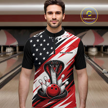 Load image into Gallery viewer, A man stands in a bowling alley wearing a black, white, and red bowling shirt with stars, diagonal stripes, a cobra, pins, and an red ball.