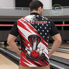 Load image into Gallery viewer, Back view of a man in a bowling alley wearing a black, white, and red american flag cobra-themed shirt with “Team Name” across the shoulders.
