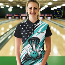 Load image into Gallery viewer, A woman stands in a bowling alley wearing a black, white, and blue bowling shirt with stars, diagonal stripes, a cobra, pins, and an blue ball.