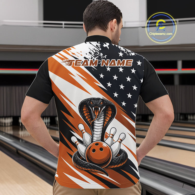 Back view of a man in a bowling alley wearing a black, white, and orange american flag cobra-themed shirt with “Team Name” across the shoulders.