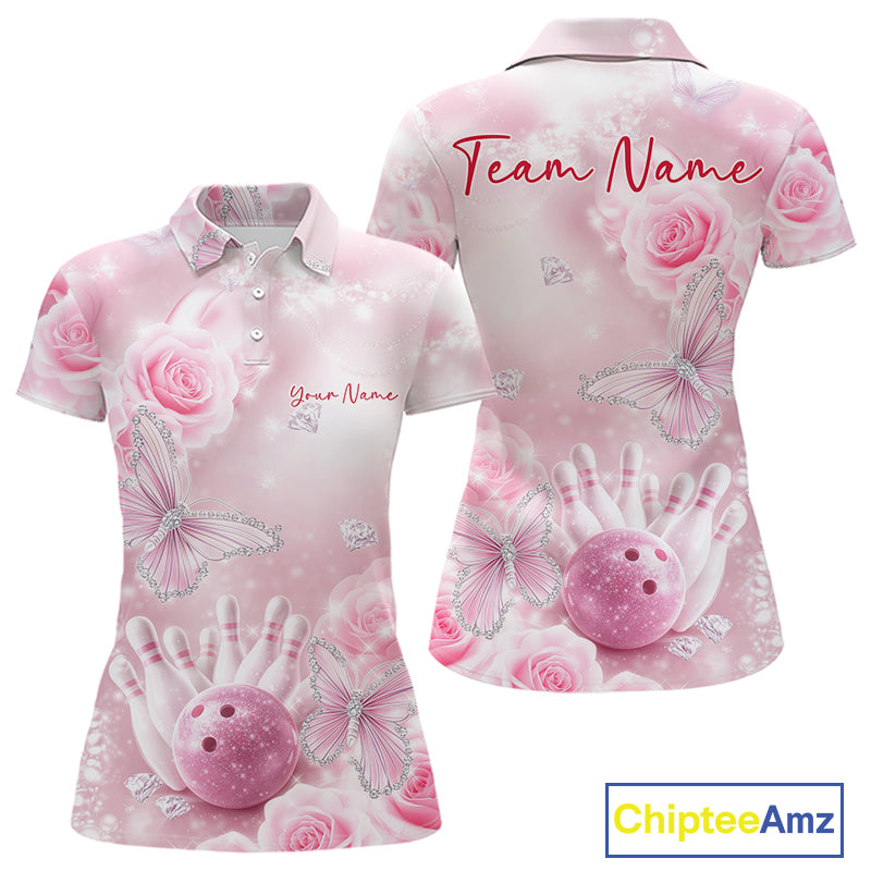 Front and back display of a women’s bowling polo shirt featuring pink glitter butterfly motifs, roses, bowling pins, and a bowling ball centerpiece.
