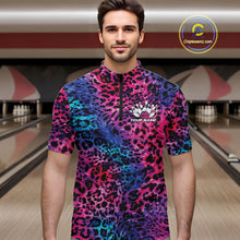Load image into Gallery viewer, Man in a bowling alley wearing a blue, purple, pink, and black leopard-print bowling quarter zip shirt with “Your Name” and a bowling pins graphic on the chest.
