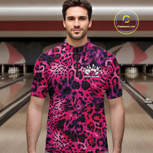 Load image into Gallery viewer, Man in a bowling alley wearing a pink, purple, and black leopard-print bowling quarter zip shirt with “Your Name” and a bowling pins graphic on the chest.
