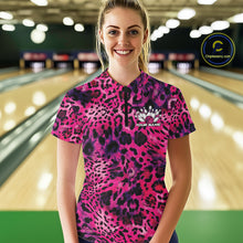 Load image into Gallery viewer, Smiling woman in a bowling alley wearing a pink, purple, and black leopard-print bowling quarter zip shirt with “Your Name” and a bowling pins graphic on the chest.