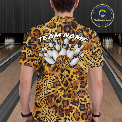 Back view of a man wearing a yellow, brown, and black leopard-print bowling shirt with “Team Name” above bowling pins and a patterned ball.