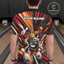 Load image into Gallery viewer, Back view of a male model wearing a black, red, and orange bowling polo shirt showcasing a crowned cartoon bowling ball with a royal scepter leading animated bowling pins through vibrant bursts of color in a bowling lane.