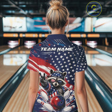 Load image into Gallery viewer, Back view of a female model at a bowling lane wearing a bowling polo shirt with a patriotic raccoon flashing a peace sign as a red, white, and blue bowling ball crashes through falling pins against a flowing American flag backdrop.