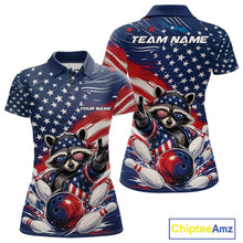Load image into Gallery viewer, Front and back view of a women's bowling polo shirt mockup showcasing a patriotic raccoon flashing a peace sign with a red, white, and blue bowling ball striking pins beneath a flowing American flag.