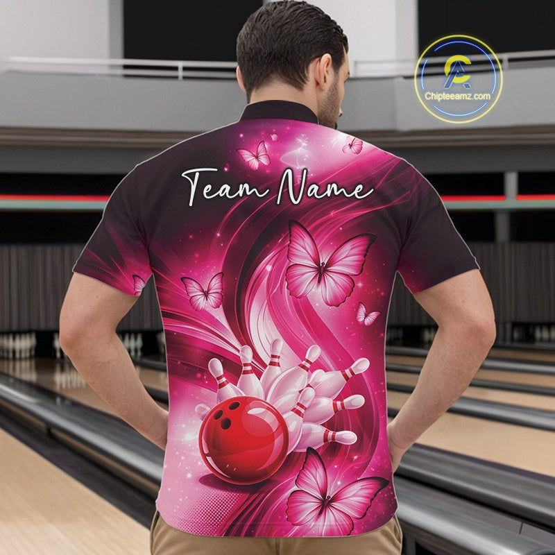 Front view of a pink bowling quarter-zip shirt displaying a bowling strike illustration enhanced with butterfly details.