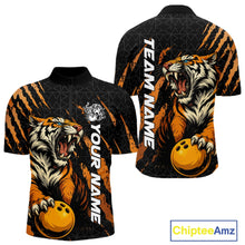 Load image into Gallery viewer, Front and back view of a black and yellow men's bowling quarter-zip shirt featuring a roaring tiger holding a yellow bowling ball with orange claw-stripe graphics and a geometric background pattern.