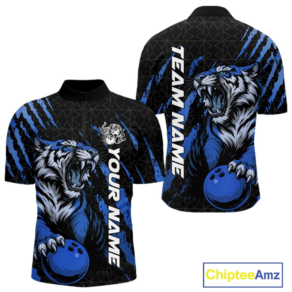 Front and back view of a black and mid blue men's bowling quarter-zip shirt showcasing a roaring tiger holding a mid blue bowling ball with matching claw-stripe artwork and a geometric background pattern.