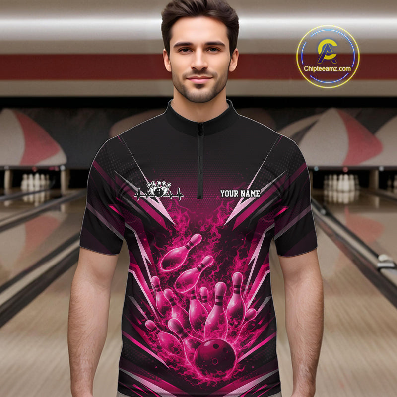 Male model in bowling lane wearing quarter-zip shirt with flaming bowling ball striking pins pink dynamic sports fire design
