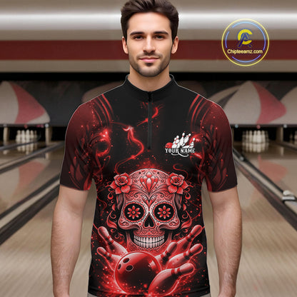 Male model wearing a black and red bowling quarter-zip shirt at a bowling lane with Day of the Dead-inspired sugar skull and bowling graphics.