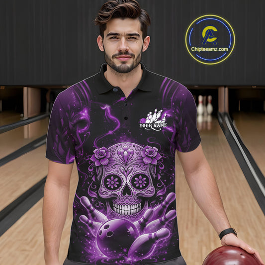 Male model at a bowling lane wearing a black and purple polo shirt with sugar skull artwork and bowling-themed design.