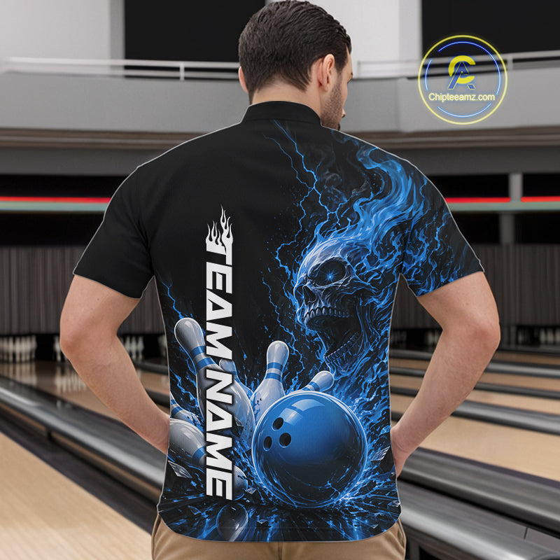 Front view of a male model in a bowling alley wearing a black quarter zip bowling shirt with a blue flaming skull, lightning, bowling pins, and a custom name.
