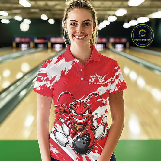 Front view of a female model in a bowling alley wearing a red custom bowling polo shirt with a fierce yet funny crawfish bowling character and a distressed background design.
