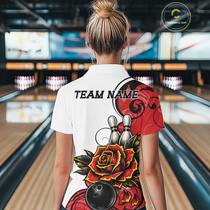A woman viewed from behind wearing a white bowling quarter zip shirt with a bold red, black, and yellow floral graphic on the back and the text 'TEAM NAME'
