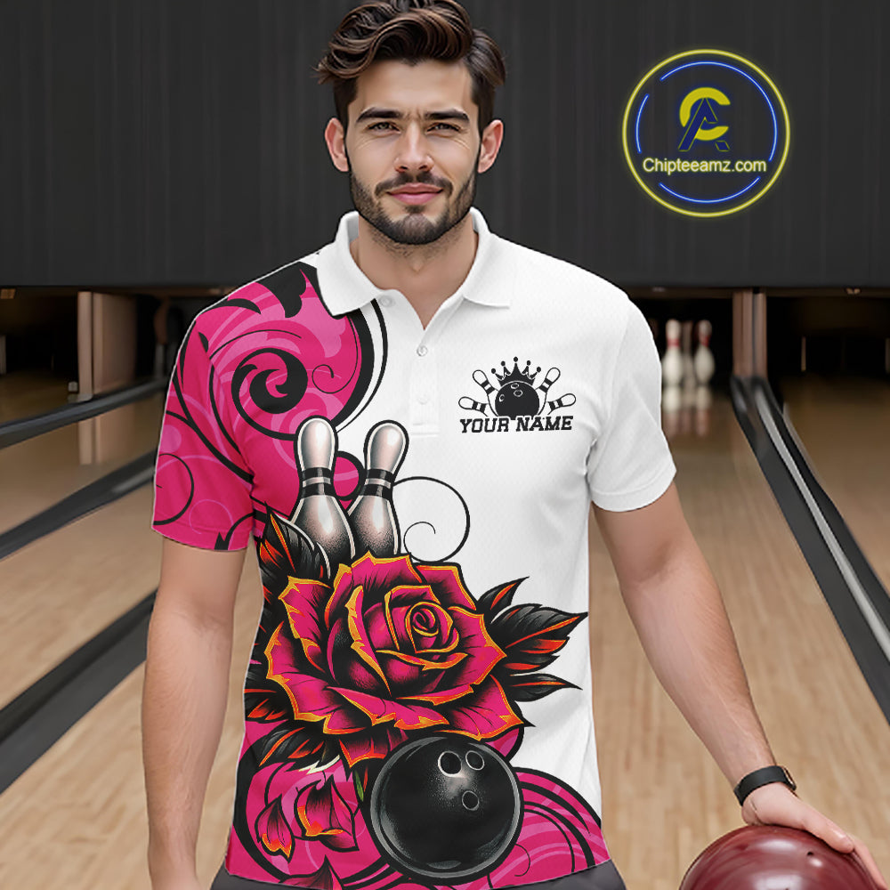 A man wearing a white short-sleeve polo shirt with a vibrant pink and black bowling-themed graphic print, standing in a bowling alley holding a bowling ball. 
