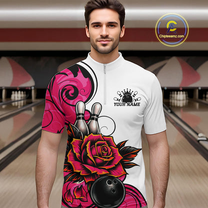 A man wearing a white short-sleeve bowling-themed graphic quarter zip shirt  with pink and black floral designs, bowling pins, and a crown logo with placeholder text 'YOUR NAME'. 