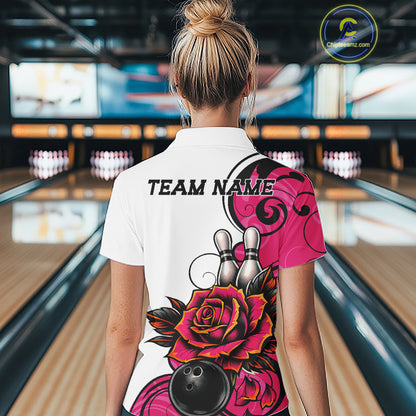 A woman viewed from behind wearing a white bowling quarter zip shirt with a vibrant pink and black graphic design featuring roses, bowling pins, and a bowling ball.