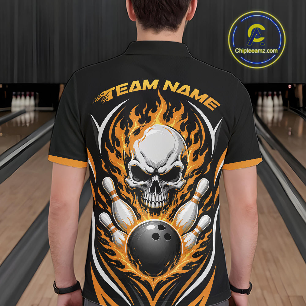 A person viewed from behind wearing a black short-sleeve polo shirt with a large bowling-themed graphic on the back. The design features a white skull, orange and yellow flames, bowling pins, and a black bowling ball, with the text 'TEAM NAME' across the upper back.