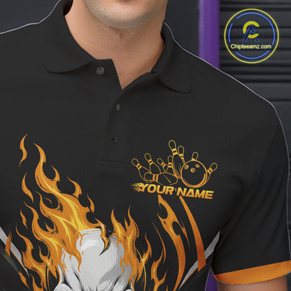 A close-up of a black polo shirt worn by a model, featuring a custom bowling-themed graphic with orange and yellow flames, bowling pins, a bowling ball, and the placeholder text 'YOUR NAME'.