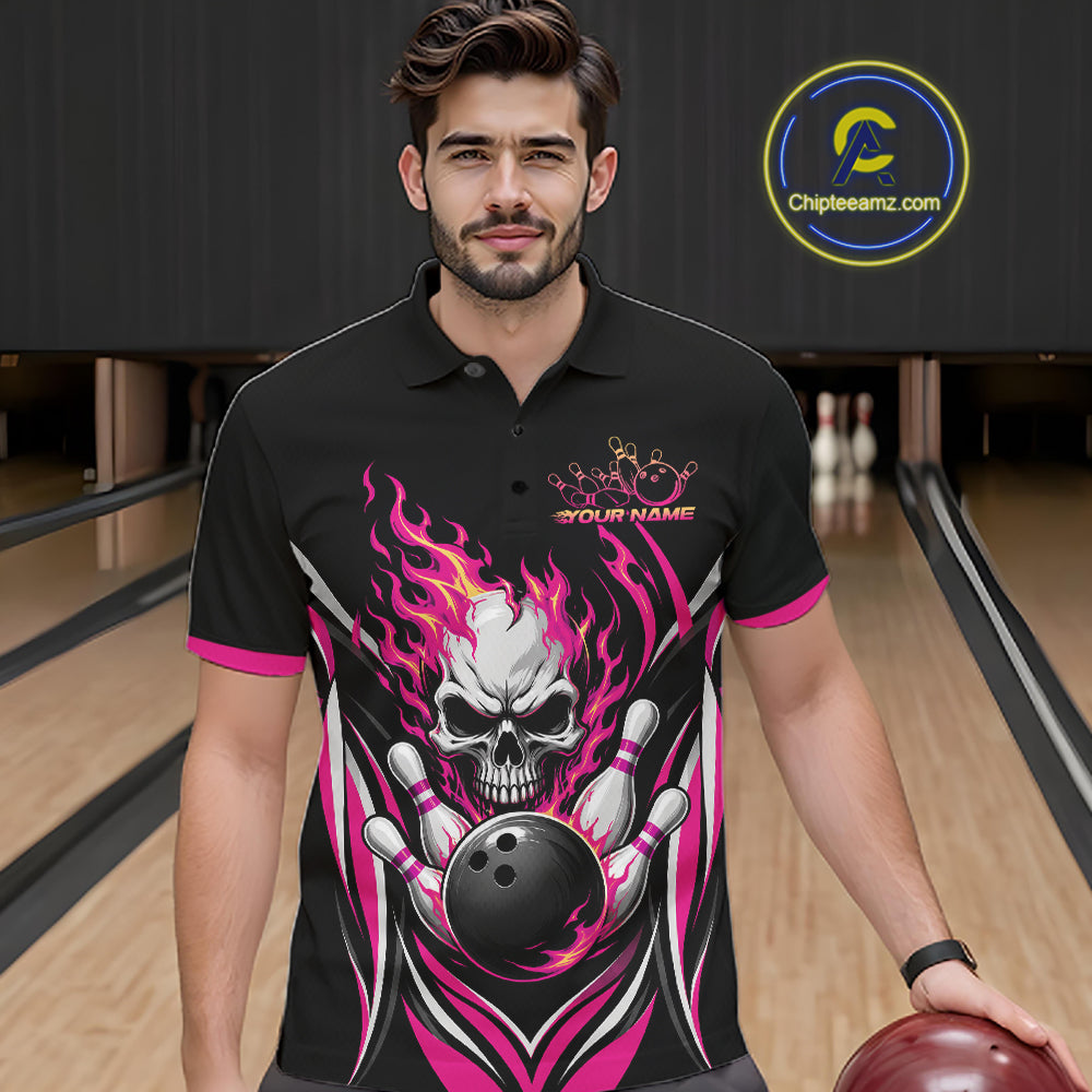 A man wearing a black short-sleeve bowling polo shirt with a large skull and flame graphic in pink, white, and gray on the front. 