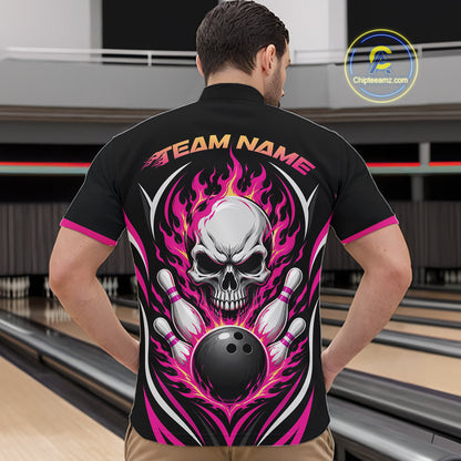 A man viewed from behind wearing a black short-sleeve bowling shirt with a large back graphic featuring a skull, bowling pins, a bowling ball, and pink flames. 