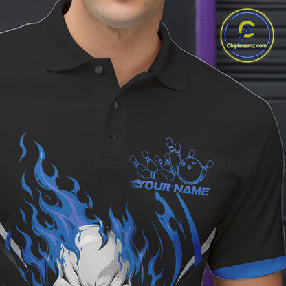 A close-up of a black polo shirt with blue flame graphics and a bowling pin graphic with the text 'YOUR NAME'. 