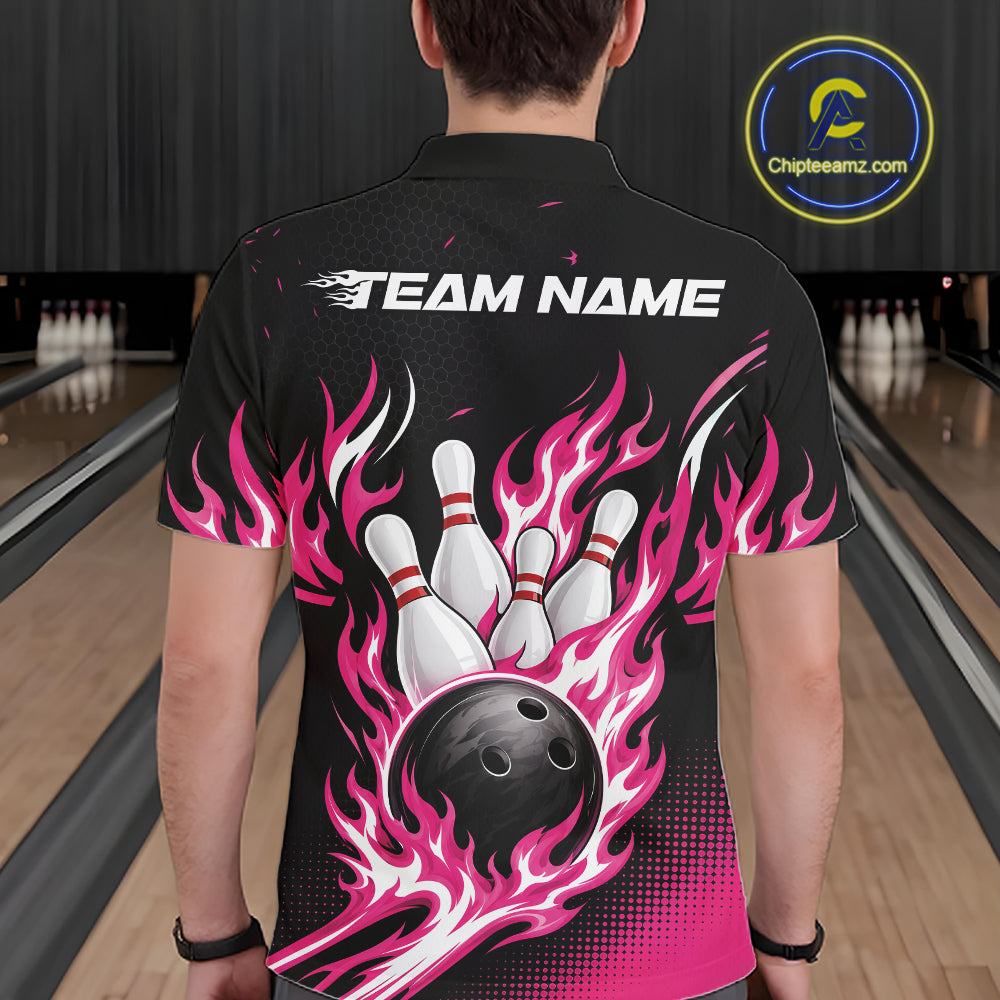 A man viewed from behind wearing a black short-sleeve bowling shirt with a large graphic of a bowling ball and pins surrounded by pink and white flames, with 'TEAM NAME' printed across the upper back