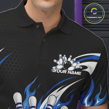 A close-up of a black short-sleeve polo shirt with blue flaming bowling ball and pin graphics