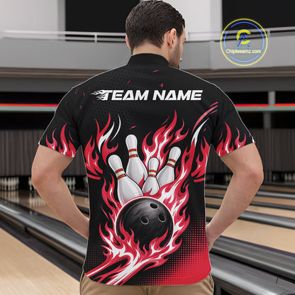 A man viewed from behind wearing a black short-sleeve bowling shirt with a large graphic print of white bowling pins, a black bowling ball, and red and white flames. 