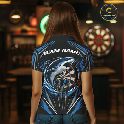 A woman viewed from behind wearing a custom short-sleeve polo shirt with a shark and dartboard graphic on the back