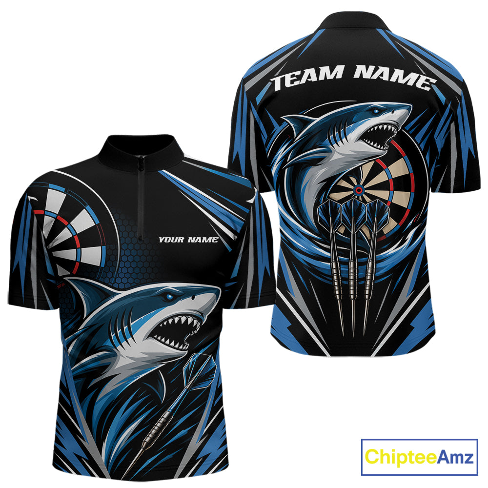 Custom darts short-sleeve quarter zip shirt shown from the front and back, featuring a bold blue and gray shark graphic over a black background with dartboard designs and placeholder text 'TEAM NAME' and 'YOUR NAME'.