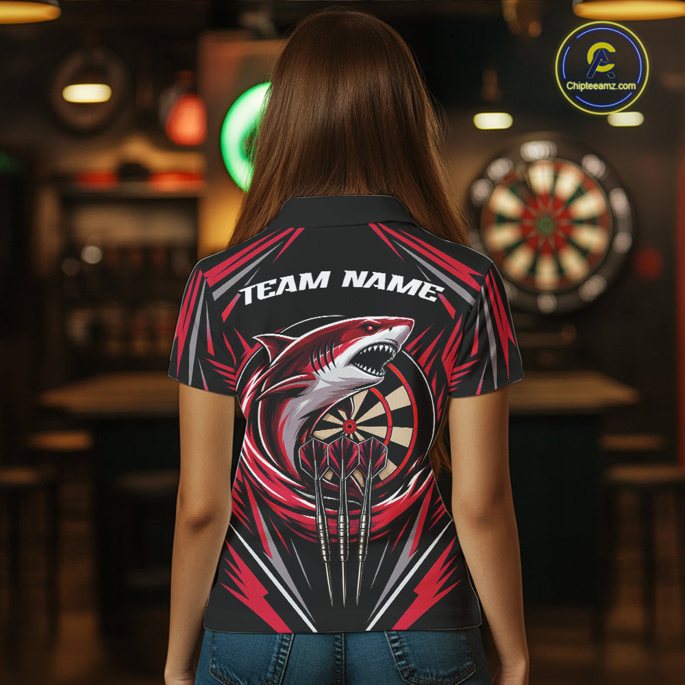 A woman viewed from behind wearing a short-sleeve black polo shirt with a large shark and dartboard graphic on the back