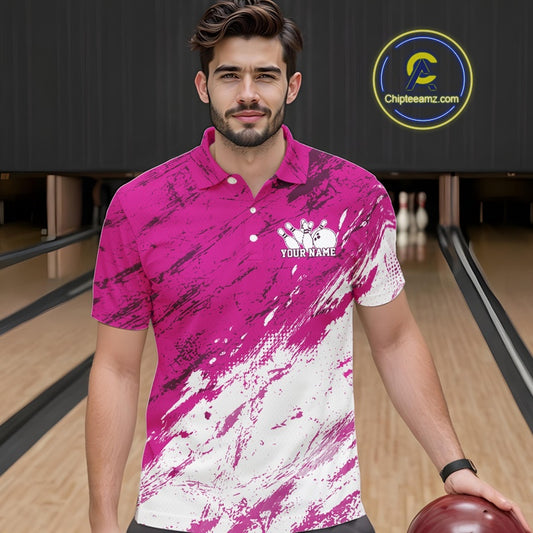 Man wearing a pink and white polo shirt with 'Your Name' text on a bowling alley background
