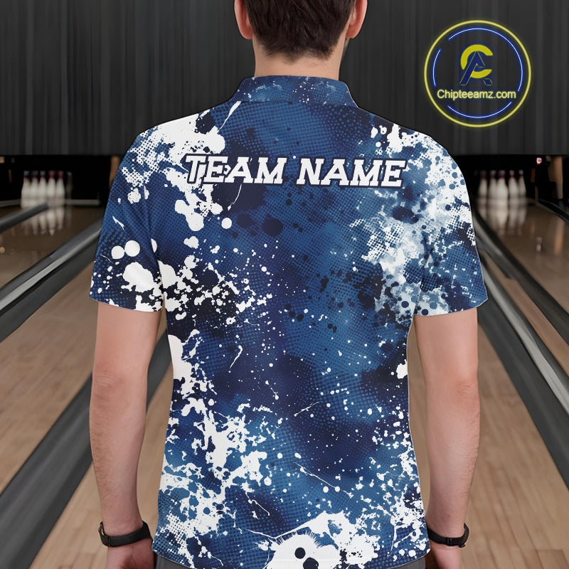 Person wearing a blue and white patterned bowling shirt with 'TEAM NAME' on a bowling alley.