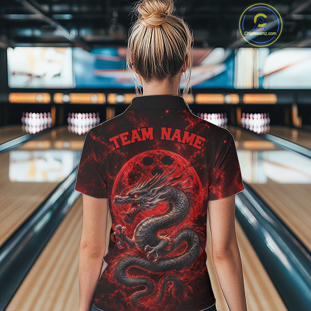 Back view of a female model in a bowling alley wearing a red custom quarter-zip bowling shirt featuring an ancient dragon, flames, and a moon-inspired bowling ball design.