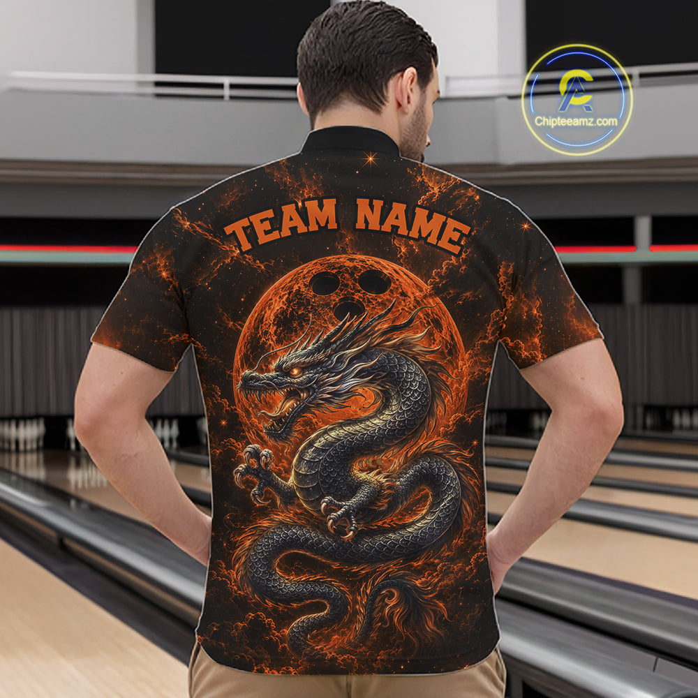 Back view of a male model in a bowling alley wearing an orange custom quarter-zip bowling shirt featuring an ancient dragon, flames, and a moon-inspired bowling ball design.