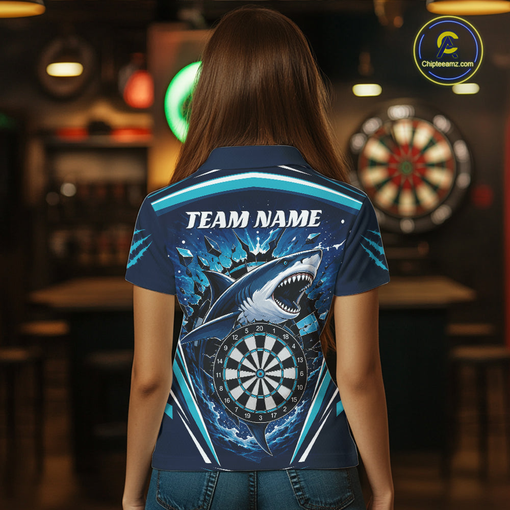 A woman viewed from behind wearing a short-sleeve collared shirt with a large shark and dartboard graphic on the back, featuring the text 'TEAM NAME' 