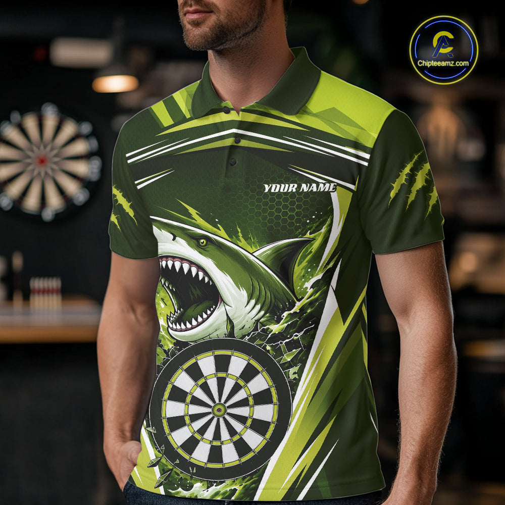 A man wearing a green and black short-sleeve polo shirt with a shark graphic and dartboard design