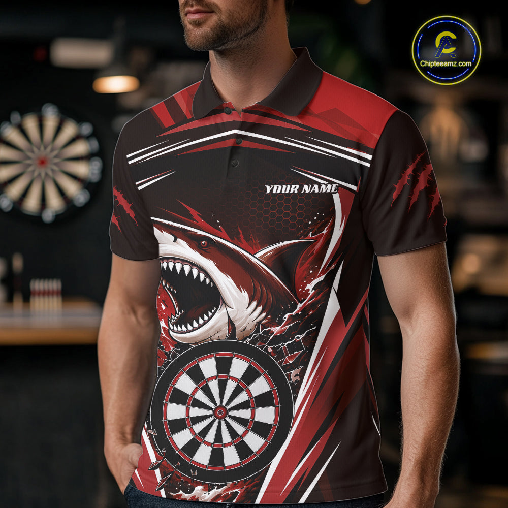 A man wearing a short-sleeve polo shirt with a shark and dartboard graphic design in red, black, and white. The shirt features the text 'YOUR NAME' on the chest