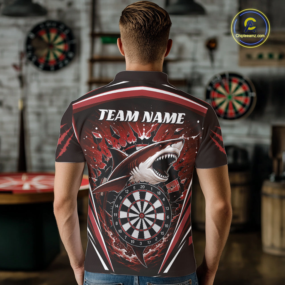 A man viewed from behind wearing a short-sleeve dark gray polo shirt with a large red, white, and black shark graphic and a dartboard design on the back. 