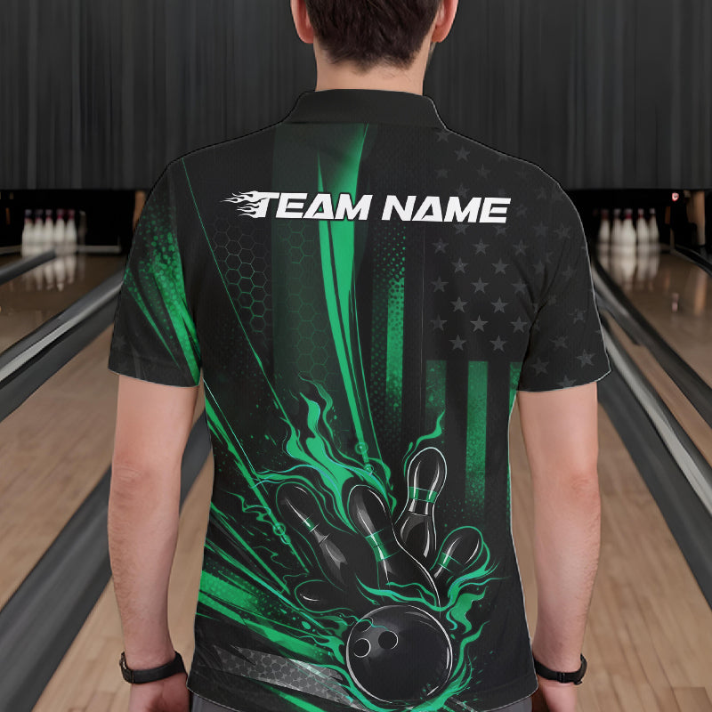 Back view of a male model in a bowling center wearing a black and green polo featuring a flaming bowling ball and distressed flag design.