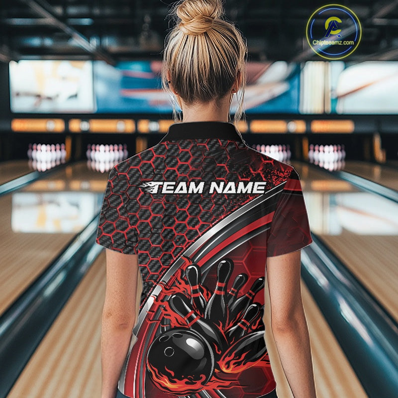 Back view of a female model in a bowling venue wearing a black and red polo shirt, showcasing honeycomb pattern with a flaming bowling action graphic.