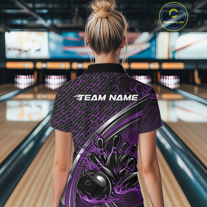 Back view of a women s black and purple bowling quarter zip displaying honeycomb details and flame bowling-themed graphics at the bowling lane.
