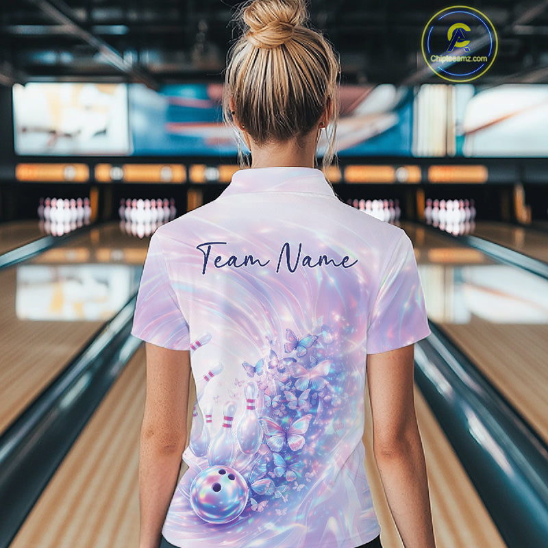 Back view of a female model in a bowling polo showcasing pastel purple and pink holographic butterfly artwork and bowling graphics