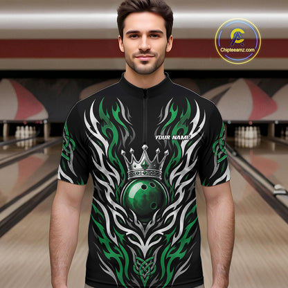 A man wearing a black short-sleeve quarter zip shirt with a green and white tribal flame design, a crown graphic, and a green bowling ball motif. The jersey has 'YOUR NAME' printed on the chest.